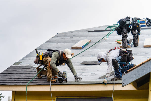 Professional Gutter Installation technician working in Ballantine, MT